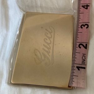 Gucci purse mirror